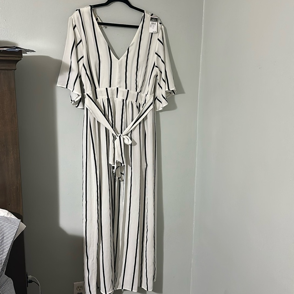 New with tags. Shorts romper with attached floor length cover.